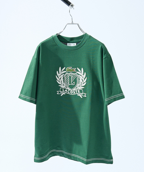 LACOSTE(ラコステ)の「【LACOSTE / ラコステ】ハンドステッチ風フレンチグラフィックTシャツ(Tシャツ/カットソー・メンズ・ネイビー/グリーン/オフホワイト・L/M)」の1枚目の写真