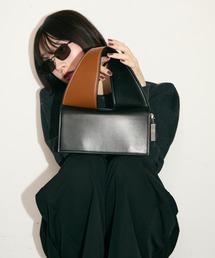 UNDERSTATEMENTs（アンダーステイトメント）の「バイカラーブロックハンドルバッグ/ロゴプレート付き（ハンドバッグ）」