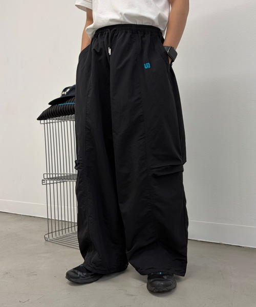 UNDERSTATEMENTs(アンダーステイトメント)の「【ユニセックス】ワンポイント刺繍ナイロンパンツ/セットアップ着用可(その他パンツ・メンズ・ブラック/アイボリー/ブラウン/グレー・SMALL/MEDIUM/LARGE)」の20枚目の写真