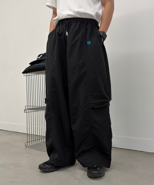 UNDERSTATEMENTs(アンダーステイトメント)の「【ユニセックス】ワンポイント刺繍ナイロンパンツ/セットアップ着用可(その他パンツ・メンズ・ブラック/アイボリー/ブラウン/グレー・SMALL/MEDIUM/LARGE)」の21枚目の写真