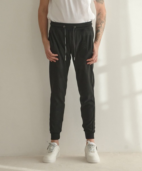 1piu1uguale3 RELAX（ウノピュウノウグァーレトレリラックス）の「【1PIU1UGUALE3 RELAX/ウノピゥウノウグァーレトレ リラックス/別注/セットアップ対応/ストレッチ素材】カモ柄ニットジャガード スリムイージーパンツ（スウェットパンツ・メンズ・ブラック・M/L/LL）」の11枚目の写真