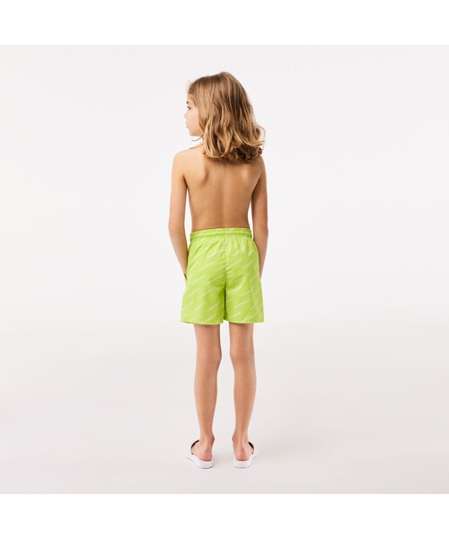 【セール】BOYS グラフィカルブランドネームロゴ総柄スイムトランクス（水着）｜LACOSTE（ラコステ）