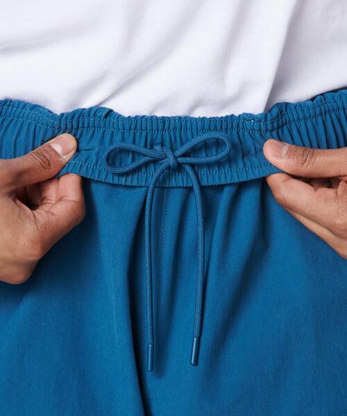 UNDER ARMOUR（アンダーアーマー）の「UAナイロン トラックパンツ（ライフスタイル/メンズ）（その他パンツ・メンズ・ブルー系・L/XL/M/S/3XL/2XL）」の16枚目の写真