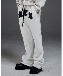 MWOONG（ムン）の「M.C.R. code stud P IV F（スウェットパンツ）」