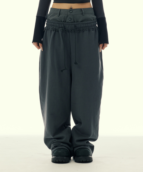 GILAARCHIVE(ギラアーカイブ)の「LAYERED WAIST SWEAT PANTS_CHARCOAL(スウェットパンツ・レディース・その他・FREE)」の1枚目の写真