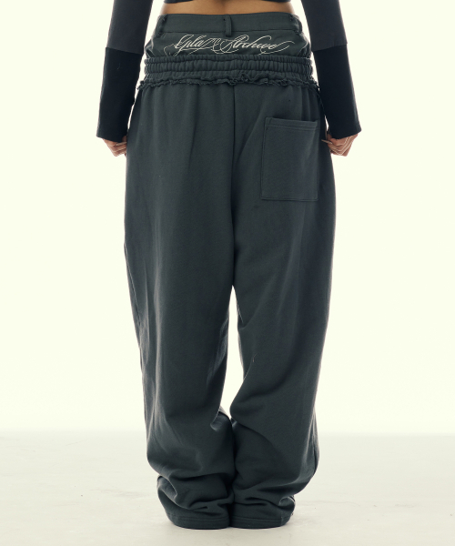 GILAARCHIVE(ギラアーカイブ)の「LAYERED WAIST SWEAT PANTS_CHARCOAL(スウェットパンツ・レディース・その他・FREE)」の3枚目の写真