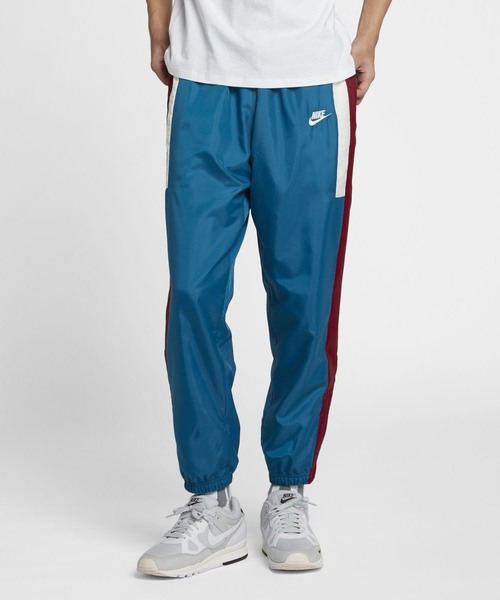 NIKE(ナイキ)の「ナイキ スポーツウェア メンズ ウーブン パンツ / NIKE《セットアップ対応商品》(パンツ)」|ブルー