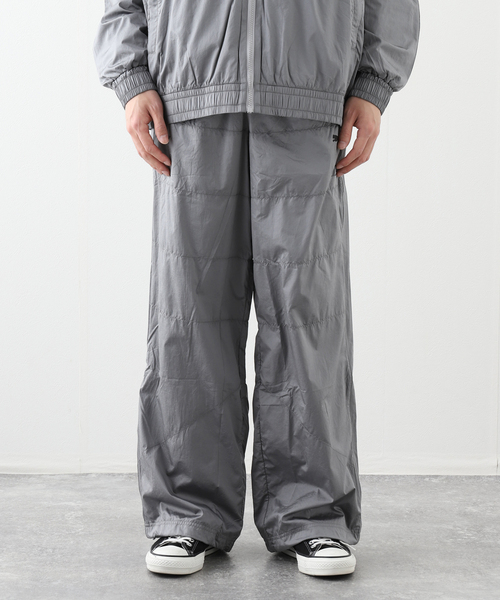 HOUSE OF HACKNEY for PUMA(ハウスオブハックニーフォープーマ)の「PUMA / プーマF1 T7 TRACK PANTS(その他パンツ・メンズ・ブラック/シルバー・SMALL/MEDIUM)」の6枚目の写真