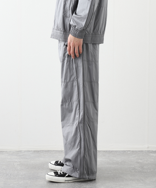 HOUSE OF HACKNEY for PUMA(ハウスオブハックニーフォープーマ)の「PUMA / プーマF1 T7 TRACK PANTS(その他パンツ・メンズ・ブラック/シルバー・SMALL/MEDIUM)」の9枚目の写真