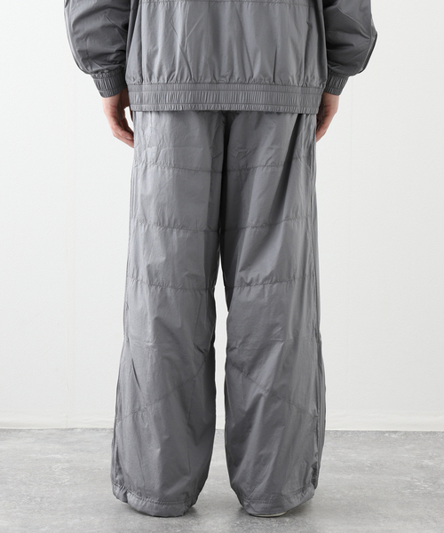 HOUSE OF HACKNEY for PUMA(ハウスオブハックニーフォープーマ)の「PUMA / プーマF1 T7 TRACK PANTS(その他パンツ・メンズ・ブラック/シルバー・SMALL/MEDIUM)」の10枚目の写真
