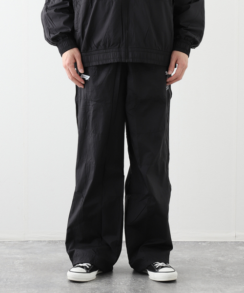 HOUSE OF HACKNEY for PUMA(ハウスオブハックニーフォープーマ)の「PUMA / プーマF1 T7 TRACK PANTS(その他パンツ・メンズ・ブラック/シルバー・SMALL/MEDIUM)」の8枚目の写真