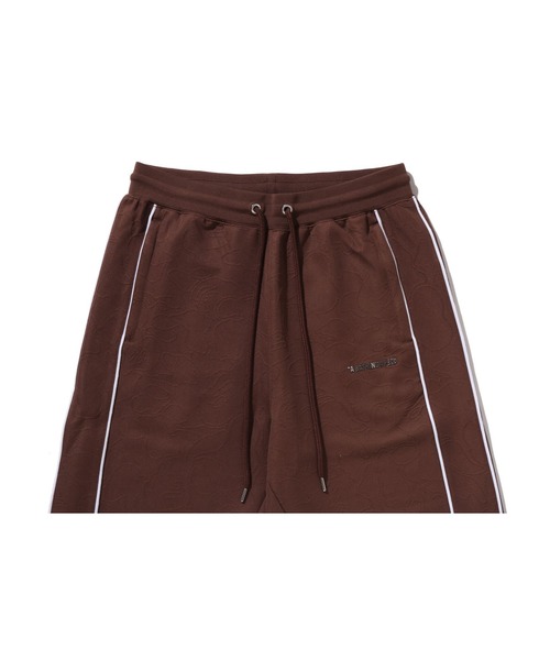 A BATHING APE（アベイシングエイプ）の「LINE CAMO JACQUARD METAL LOGO RELAXED FIT TRACK SWEAT PANTS（その他パンツ・メンズ・ブラック/ブラウン・MEDIUM/SMALL/LARGE/X-LARGE/XX-LARGE）」の6枚目の写真