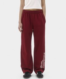 TAKEASY（テイクイージー）の「ウィメンズフレキシビリティサベージワイドパンツ（バーガンディ）（スウェットパンツ）」