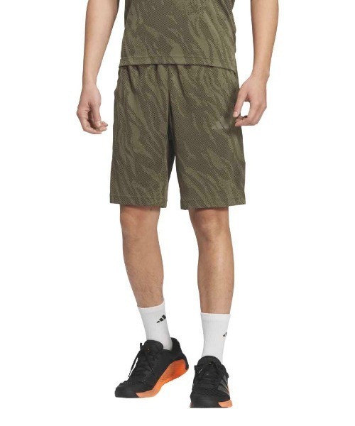 adidas(アディダス)の「アディダス adidas テック エッセンシャルズ クール タッチ レギュラーフィット カモ AOP 9インチ ショーツ(その他パンツ・メンズ・オリーブ/ブルー/ダークグレー・S/M/L/LL/3L)」の1枚目の写真