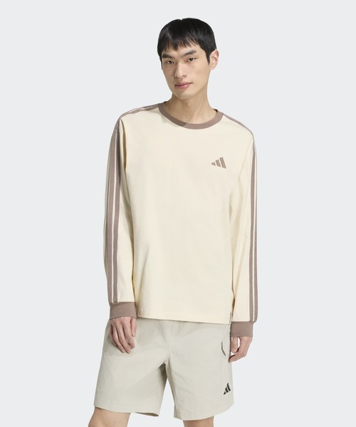 adidas(アディダス)の「エッセンシャルズ プラス ルーズフィット スリーストライプス シングルジャージー 長袖Tシャツ / ロンT / アディダス adidas(Tシャツ/カットソー・メンズ・ホワイト系その他・3XL/XX-LARGE/X-SMALL/X-LARGE/SMALL/MEDIUM/LARGE)」の1枚目の写真