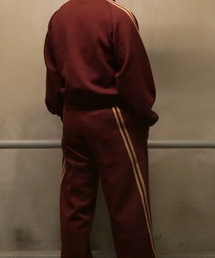 TENEZ（テネス）の「TENEZ Track Pants Two Stripes (エンジ)（スウェットパンツ）」