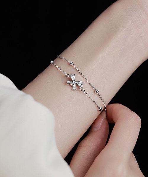 TONE SELECT GOODS（トーンセレクトグッズ）の「【float】リボンモチーフ シルバー チェーン 2連ブレスレット（ブレスレット・レディース・シルバー・FREE）」の2枚目の写真