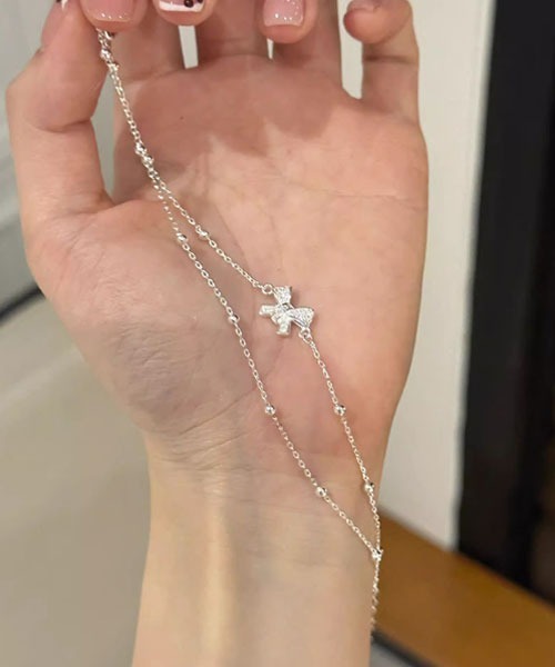 TONE SELECT GOODS（トーンセレクトグッズ）の「【float】リボンモチーフ シルバー チェーン 2連ブレスレット（ブレスレット・レディース・シルバー・FREE）」の4枚目の写真