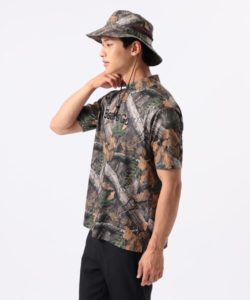 BEAMS GOLF(ビームスゴルフ)の「ORANGE LABEL / バッグロゴ ツリーカモ モックネックシャツ(吸水速乾・UVカット)(Tシャツ/カットソー・メンズ・ブラック/その他・XL/L/M/S)」の1枚目の写真