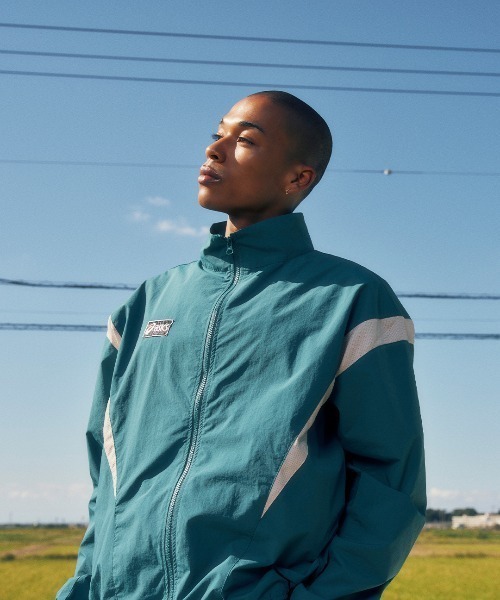 ASICS(アシックス)の「CLASSIC WOVEN TRACK JACKET 2203A342.300(ナイロンジャケット・メンズ・ブルー・LARGE)」の1枚目の写真