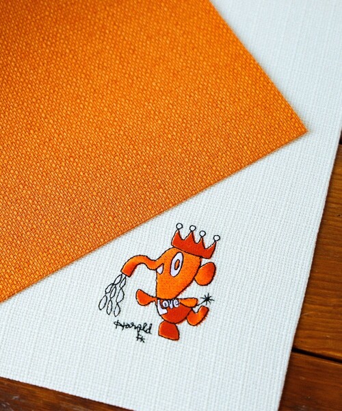 HERMES ランチョンマット 大判サイズ 馬車刺繍 オレンジ コットン100% 安齋肇「魔法の象」ランチョンマット（ランチョンマット/テーブル