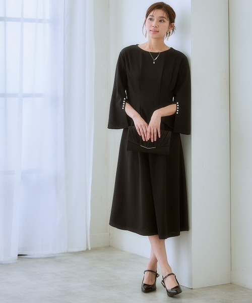 7days Life Styling(セブンデイズライフスタイリング)の「カットソー素材パール調ボタン袖スリットワンピース(ワンピース・レディース・ネイビー/ブラック・3L/LL/L/M/S/4L/5L/6L)」の5枚目の写真