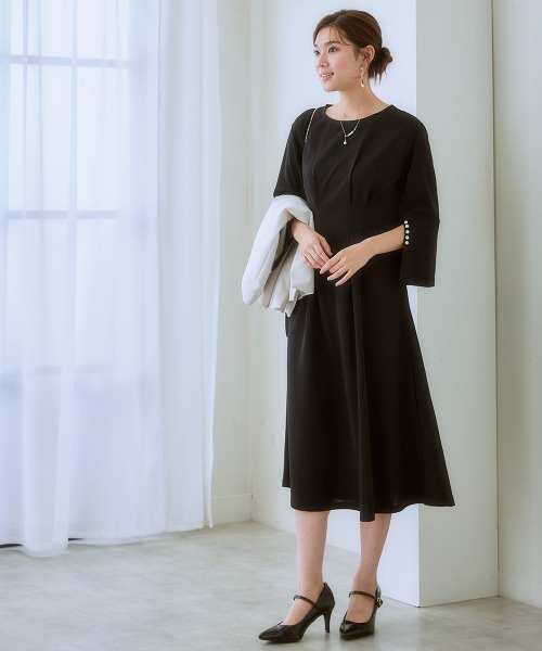 7days Life Styling(セブンデイズライフスタイリング)の「カットソー素材パール調ボタン袖スリットワンピース(ワンピース・レディース・ネイビー/ブラック・3L/LL/L/M/S/4L/5L/6L)」の6枚目の写真