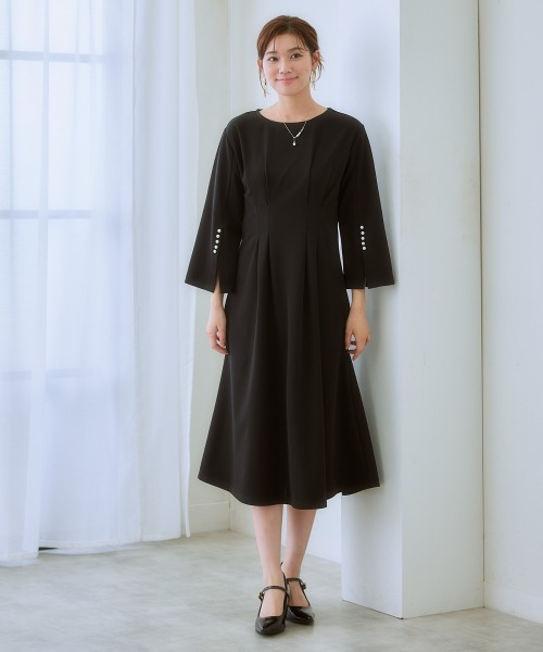 7days Life Styling(セブンデイズライフスタイリング)の「カットソー素材パール調ボタン袖スリットワンピース(ワンピース・レディース・ネイビー/ブラック・3L/LL/L/M/S/4L/5L/6L)」の8枚目の写真