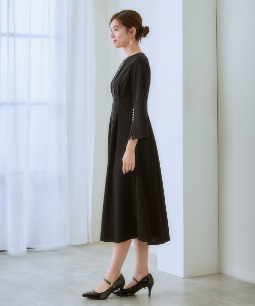 7days Life Styling(セブンデイズライフスタイリング)の「カットソー素材パール調ボタン袖スリットワンピース(ワンピース・レディース・ネイビー/ブラック・3L/LL/L/M/S/4L/5L/6L)」の9枚目の写真