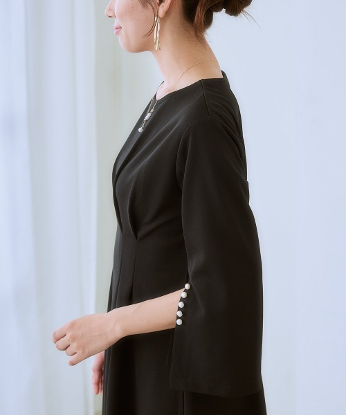 7days Life Styling(セブンデイズライフスタイリング)の「カットソー素材パール調ボタン袖スリットワンピース(ワンピース・レディース・ネイビー/ブラック・3L/LL/L/M/S/4L/5L/6L)」の12枚目の写真