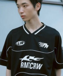 ROMANTIC CROWN（ロマンティッククラウン）の「A'GEM/9 × .kom 『ROMANTIC CROWN/ロマンティック クラウン』 /パイピングスポーツジャージ（Tシャツ/カットソー）」