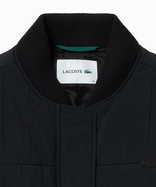 LACOSTE(ラコステ)の「クロップド丈 撥水 THERMORE中綿 ジップアップベスト(ダウンベスト・レディース・ブラック/オフホワイト・34/36/38/40)」の7枚目の写真