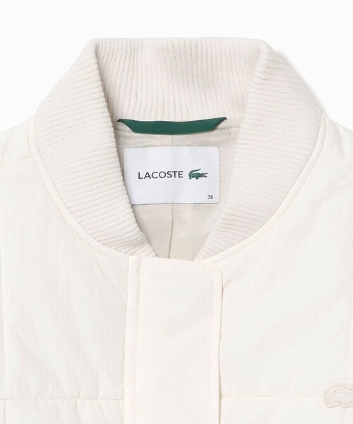 LACOSTE(ラコステ)の「クロップド丈 撥水 THERMORE中綿 ジップアップベスト(ダウンベスト・レディース・ブラック/オフホワイト・34/36/38/40)」の15枚目の写真