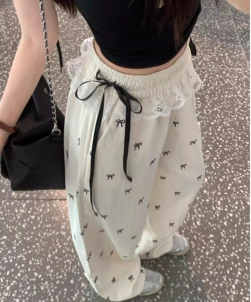 semuse(セミューズ)の「リボンプリントウエストレースリボンワイドパンツ(その他パンツ・レディース・ホワイト/ブラック・FREE)」の1枚目の写真