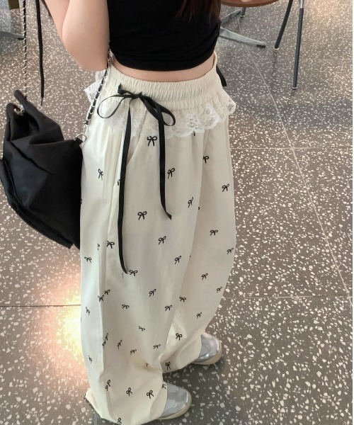 semuse(セミューズ)の「リボンプリントウエストレースリボンワイドパンツ(その他パンツ・レディース・ホワイト/ブラック・FREE)」の9枚目の写真