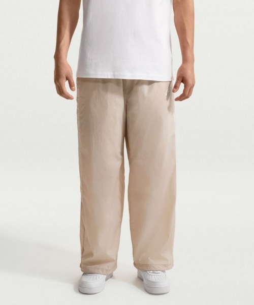 NIKE(ナイキ)の「ナイキ ウィンドランナー メンズ ライトウェイト UV パンツ / Nike Windrunner Men's Lightweight UV Pants IQ0922-236 Cream II(その他パンツ・メンズ・ブラウン系その他2・2XL/M/L/XS/XL/S)」の1枚目の写真