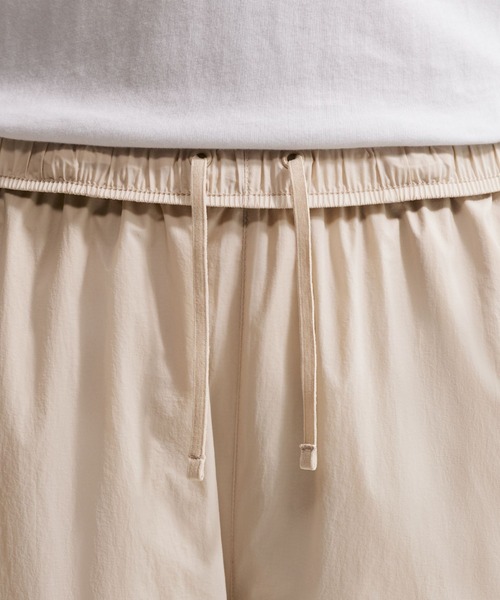 NIKE(ナイキ)の「ナイキ ウィンドランナー メンズ ライトウェイト UV パンツ / Nike Windrunner Men's Lightweight UV Pants IQ0922-236 Cream II(その他パンツ・メンズ・ブラウン系その他2・2XL/M/L/XS/XL/S)」の7枚目の写真