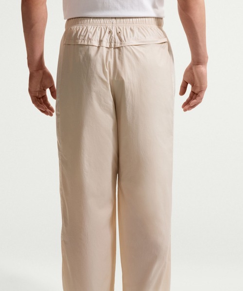 NIKE(ナイキ)の「ナイキ ウィンドランナー メンズ ライトウェイト UV パンツ / Nike Windrunner Men's Lightweight UV Pants IQ0922-236 Cream II(その他パンツ・メンズ・ブラウン系その他2・2XL/M/L/XS/XL/S)」の3枚目の写真