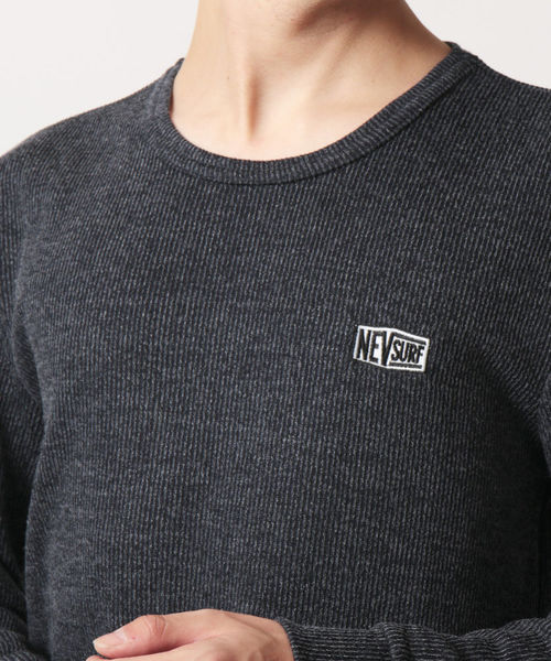 NEV(ネブ)の「ニットテレコ ワッペンロゴ クルーネック 長袖カットソー(Tシャツ/カットソー・メンズ・ブラック/ネイビー/グレー・M/L)」の6枚目の写真