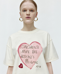 ADSB ANDERSSON BELL（アンダースンベル）の「ユニセックスハートメッセージTシャツ atb1251u(ECRU)（Tシャツ/カットソー）」