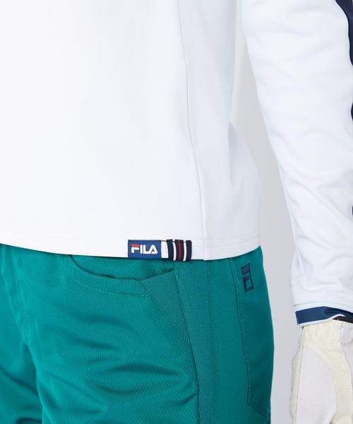 FILA(フィラ)の「【FILA GOLF/フィラゴルフ】フロントロゴ モックネック 袖ライン ストレッチ ロンT/UVカット/保温(Tシャツ/カットソー・レディース・カーキ/イエロー/ホワイト/ライトピンク/ネイビー/オレンジ・M/LL/L)」の17枚目の写真