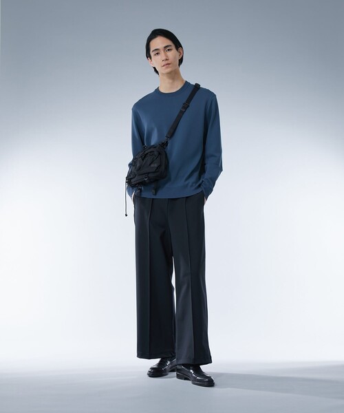 UNITED TOKYO(ユナイテッドトウキョウ)の「ハイマルチ ジャージースラックス | セットアップ着用可能(スラックス・メンズ・ネイビー/ブラック・2/1)」の7枚目の写真