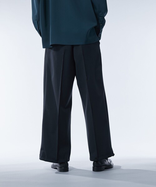 UNITED TOKYO(ユナイテッドトウキョウ)の「ハイマルチ ジャージースラックス | セットアップ着用可能(スラックス・メンズ・ネイビー/ブラック・2/1)」の10枚目の写真