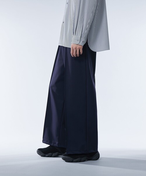 UNITED TOKYO(ユナイテッドトウキョウ)の「ハイマルチ ジャージースラックス | セットアップ着用可能(スラックス・メンズ・ネイビー/ブラック・2/1)」の17枚目の写真