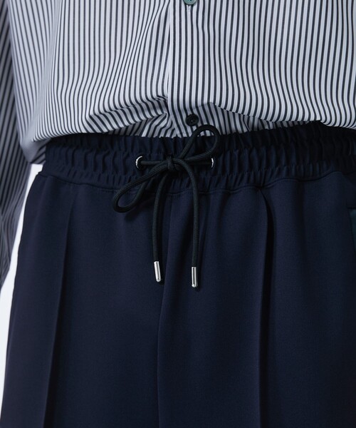 UNITED TOKYO(ユナイテッドトウキョウ)の「ハイマルチ ジャージースラックス | セットアップ着用可能(スラックス・メンズ・ネイビー/ブラック・2/1)」の19枚目の写真