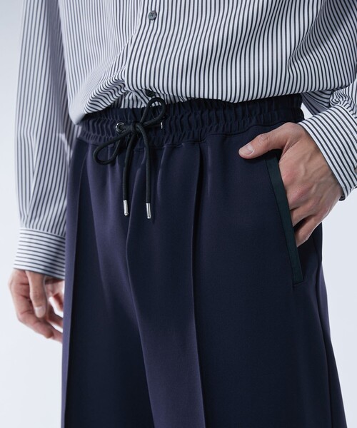 UNITED TOKYO(ユナイテッドトウキョウ)の「ハイマルチ ジャージースラックス | セットアップ着用可能(スラックス・メンズ・ネイビー/ブラック・2/1)」の20枚目の写真