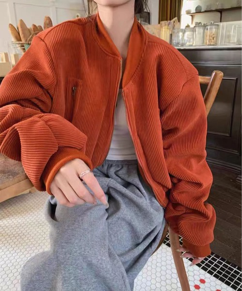 AsheKsha(アシクシャ)の「レトロでゆるやかなシルエットの万能コート(MA-1・レディース・ブラック/オレンジ・M)」の10枚目の写真