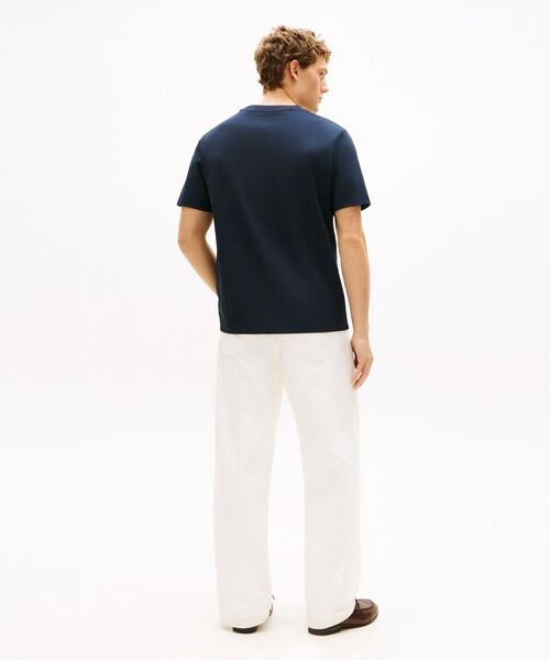 TOMMY HILFIGER(トミーヒルフィガー)の「ICON PIQUE INTERLOCK GRAPHIC TEE(Tシャツ/カットソー・メンズ・ホワイト/マルチ・MEDIUM/SMALL/LARGE/X-LARGE)」の5枚目の写真
