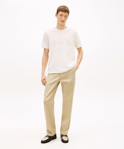 TOMMY HILFIGER(トミーヒルフィガー)の「ICON PIQUE INTERLOCK GRAPHIC TEE(Tシャツ/カットソー・メンズ・ホワイト/マルチ・MEDIUM/SMALL/LARGE/X-LARGE)」の9枚目の写真