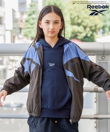 Reebok（リーボック）の「【Reebok(リーボック)】別注トラックジャケット[140~160cm](KIDS)（Tシャツ/カットソー）」
